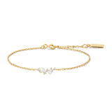 Polsera d'or amb petxines i perles