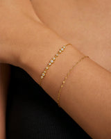 Pulsera Trios con engaste de bisel graduado en oro