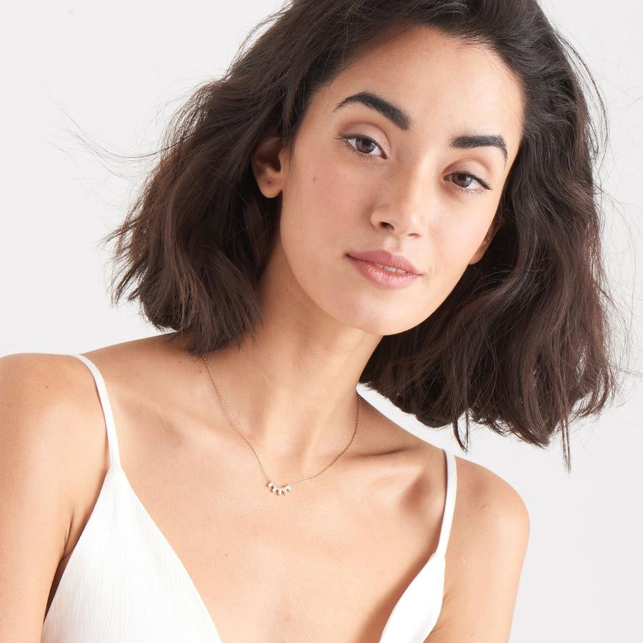 Collar Ania Haie de plata banyada en or amb barra massissa i brillantor